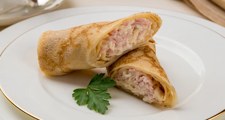 Schinken trifft Käse: Herzhafte Palatschinken mit Schinken-Käse-Fülle